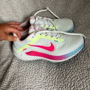 NWOT!!! Brand new Nike running shoes with colorful accents.